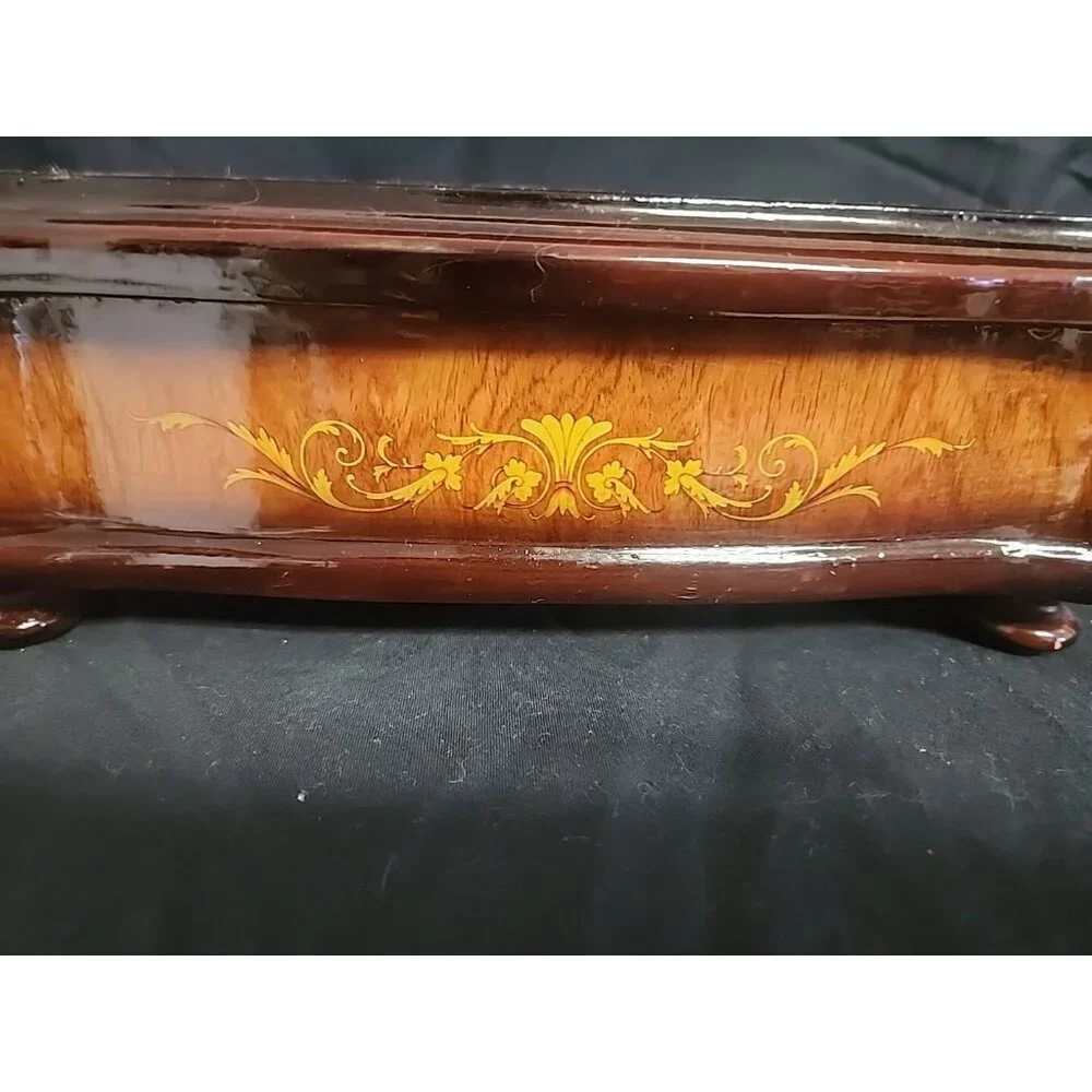 wooden jewelry box with violin pictured‎ on top